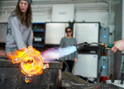 fire from a torch on a piece of glass